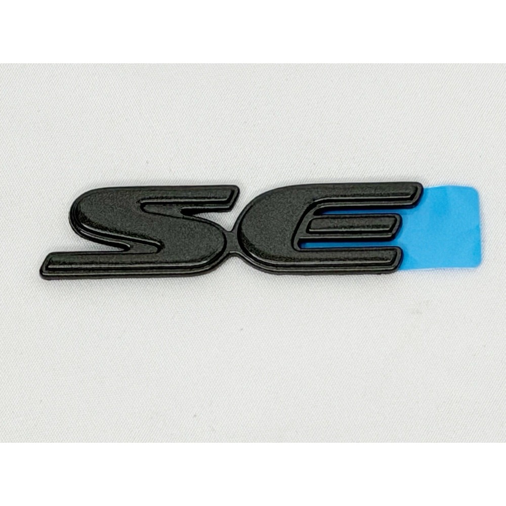 1997-2003 GENUINE GM PONTIAC GRAND PRIX SE LOGO, NEW OEM PART, P/N 10303914